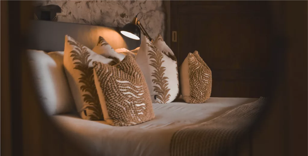 Suite bedroom at Leopard Mountain, an exclusive safari lodge with only nine suites