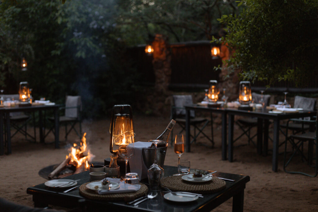 Lantern-lit boma dinner, part of the safari dining experience at Leopard Mountain