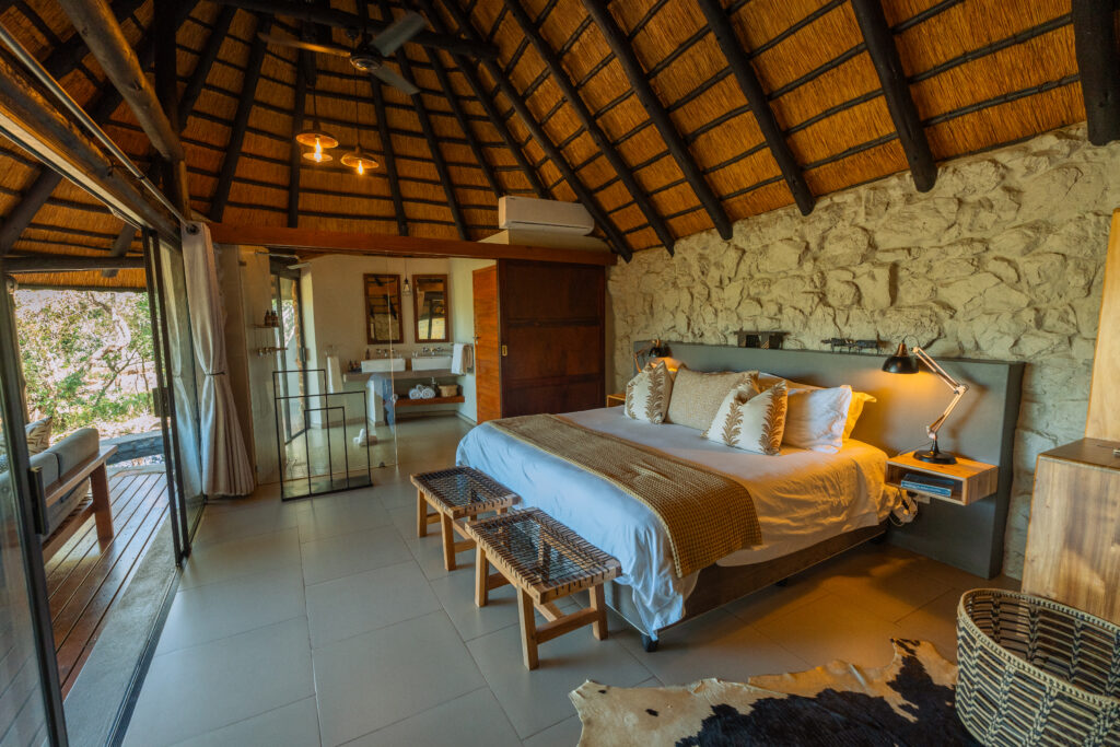 Thatched suite interior showing the subtle luxury of Leopard Mountain Safari Lodge
