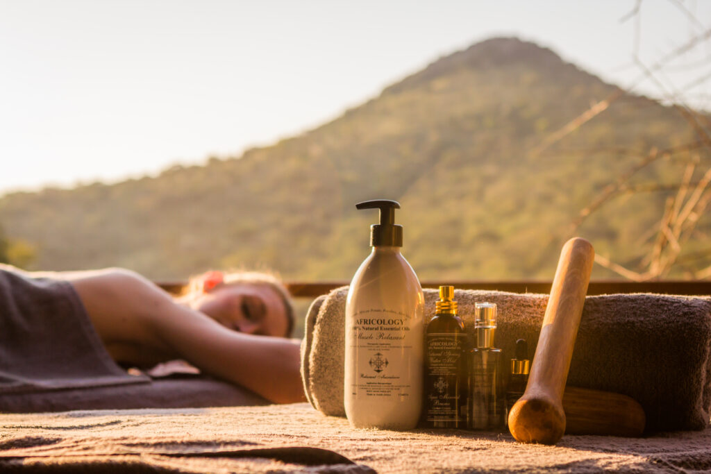 Africology spa products on a treatment table, part of a safari and spa package at Leopard Mountain